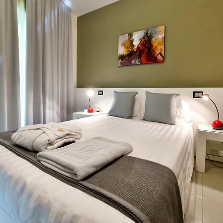 Monaco Suites Hotel Lignano Sabbiadoro Rom bilde